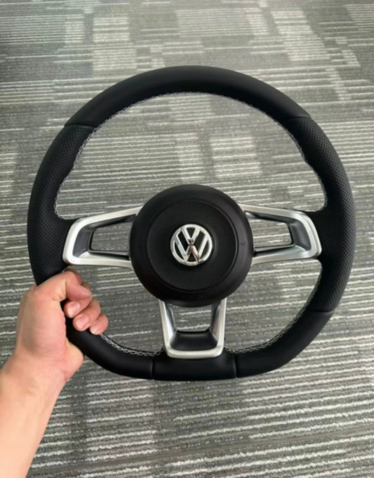 Volante volkswagen con dettagli cromati