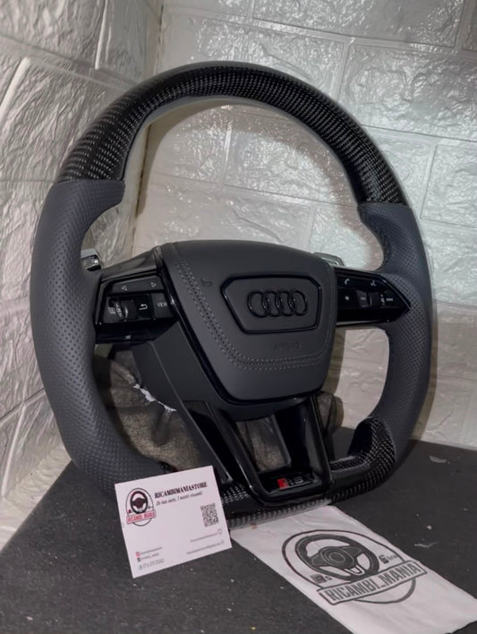 Volante per audi con pelle traforata e carbonio lucido, cn cuciture nere, tasti multifunzione e paddle